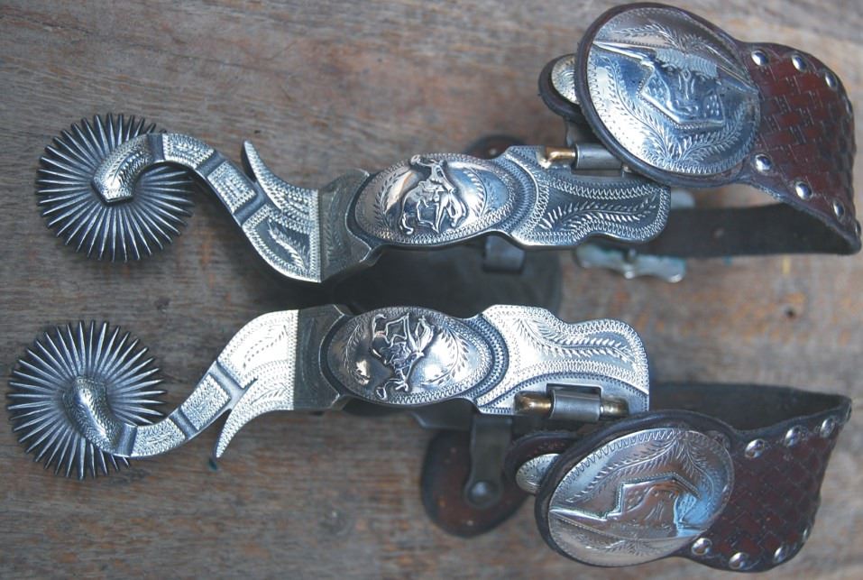 JW fancy double mounted bucking horse spurs