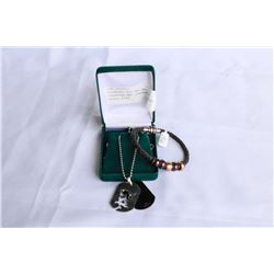 STAINLESS DOG TAG AND STAINLESS AND LEATHER BRACELET RETAIL $149