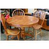 Image 2 : ROUND OAK DINING TABLE AND THREE CHAIRS