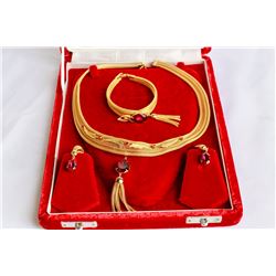 RED CASE WITH GOLD TONE AND RED STONE NECKLACE SET