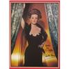 Image 1 : Davis, Bette (1908-89), A color photograph inscribed, "Hello to S. Dobbs Bette Davis." Framed....