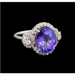 14KT White Gold 6.14 ctw Tanzanite and Diamond Ring