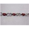 Image 2 : BRACELET - 12 OVAL FACETED RICH DEEP RED/BROWN GARNETS IN STERLING SILVER CROSS OVER LINK DESIGN SET