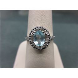 RING - BLUE TOPAZ & DIAMOND IN STERLING SILVER SETTING - 1 CT OVAL FACETTED TOPAZ & 2 DIAMONDS - RET