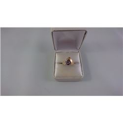 10KT YELLOW GOLD LADIES RING SET WITH ONE PEAR SHAPED PROBABLE AMETHYST + 7 BCD TW 3.8GRAM