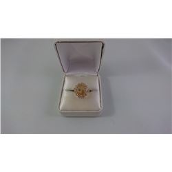 10KT YELLOW GOLD LADIES CLUSTER STYLE RING SET WITH ONE OVAL PROBABLE CITRINE + 14 WHITE STONES