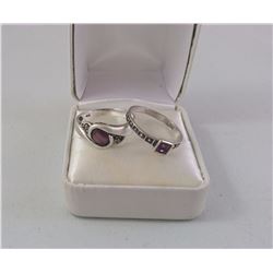 2X SILVER LADIES RING SET WITH MAUVE STONE 1 WITH 4 MARCASITES (2 MISSING) 1 OVAL AND ONE OTHER