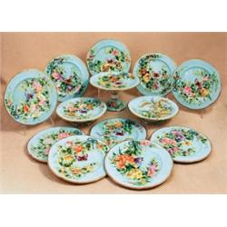 A Stafffordshire porcelain dessert service, circa 1870, the gilt rims enclosing a turquoise groun...