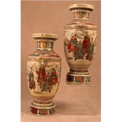 A pair of Japanese satsuma pottery vases, (Meiji period 1868-1912) of ovoid form, enamelled and g...