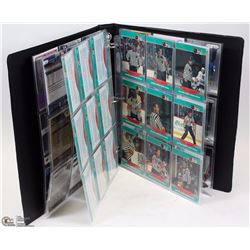 BINDER WITH 1969-1987 NHL REFS AND LINESMAN CARDS