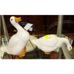 A PAIR OF HAND MADE GARDEN DUCKS