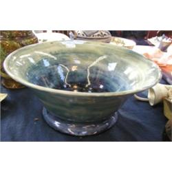 A 14" Moorcroft pale blue and green bowl, signed and impressed mark 'potters to the queen' to bas...