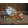 Image 1 : An 18thC Pratt ware figure of a seated Lion, 4 1/2" long....
