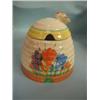 A Clarice Cliff, Newport Pottery, Crocus pattern honey pot beehive, 4"...