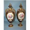 Image 1 : A pair of Royal Crown Derby heavily gilded and cobalt blue ground 10" vases with covers, central...
