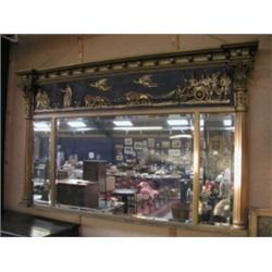 A Regency period Gilt overmantle mirror, decorated with classical chariot scenes, approx 54" x 36...