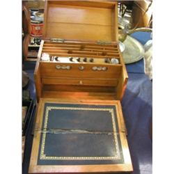 A light Oak c1900 folding stationary box, leather inset writing slope interior, letter sections,...