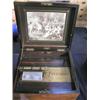 An Antique table top Polyphon, disc musical box, having front of case left to right handle windin...