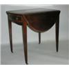 Image 1 : A quality 19thC Cross-banded Mahogany oval top Pembroke table on square tapering legs having orig...