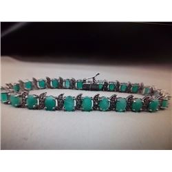 BRACELET - 13CTW (25) OVAL FACETED GREEN EMERALDS & ROUND FACETED DIAMOND IN STERLING SILVER WAVE LI