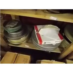 LOT OF FILM REELS IN CANS