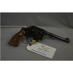 Smith & Wesson Model 10 - 5 .38 Spec Cal 6 Shot Revolver w/ 152 mm bbl [ blued finish, slight holste