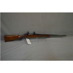 Ruger Model M77 .300 Win Mag Cal Bolt Action Rifle w/ 24" bbl [ blued finish, showing some wear and 