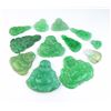 Image 1 : Very large lot of carved Green Jade weighing  over 480 carats. Estimates $800-$1,200