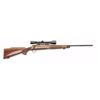 Image 1 : Remington Model 700 bolt action rifle, 7mm  EXP REM caliber, 22” barrel, blued finish,  checkered wo