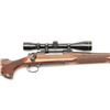 Image 3 : Remington Model 700 bolt action rifle, 7mm  EXP REM caliber, 22” barrel, blued finish,  checkered wo