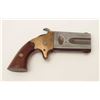 Image 2 : American Arms O/U swivel derringer, .41RF  caliber, 2.5” barrels, brass frame, wood  grips, S/N 1156