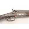 Image 5 : Beautifully engraved drilling rifle, 12 gauge  over .38-55 caliber, 28.5” Damascus barrels  (shotgun