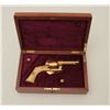 Image 1 : Engraved pinfire revolver, gold finish, ivory  grips, S/N 62033, wood presentation casing;  gun is i