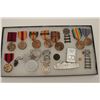 Image 1 : Riker case of U.S. military ribbons, medals,  dog tags and ephemera including a U.S. steel  pocket k