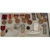 Image 2 : Riker case of U.S. military ribbons, medals,  dog tags and ephemera including a U.S. steel  pocket k