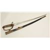 Image 2 : Japanese military dress sword with brass  mounted leather scabbard; rayskin grip.      Est.:  $200-$