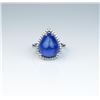 Image 1 : Gorgeous ladies ring featuring a 10.75 carat  Cabochon cut purple blue African Tanzanite  and surrou