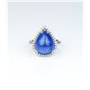 Image 4 : Gorgeous ladies ring featuring a 10.75 carat  Cabochon cut purple blue African Tanzanite  and surrou