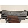 Image 3 : Japanese Nambu 8mm caliber, 4.5” barrel,  military blued finish, grooved wood grips,  S/N 53304 (mat