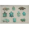 Image 2 : Riker case of approximately 10 old hand  carved turquoise stone effigies.     Est.:   $150-$300.