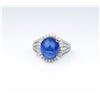 Image 1 : Stunning ladies ring featuring a Cabochon  African Tanzanite weighing approx. 7.00  carats and micro