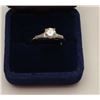 Image 2 : .85 round brilliant diamond set in platinum  with 2 side baguettes of approximately .10PT  each. The