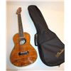 Image 1 : Fender Koa wood Ukulele with telecaster  headstock and black Fender “gig” bag; in  overall very good