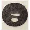 Image 1 : Large iron tsuba beautifully chiseled in  relief with dragon and pearl. A masterpiece  of the ironwo