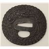 Image 2 : Large iron tsuba beautifully chiseled in  relief with dragon and pearl. A masterpiece  of the ironwo