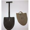 Image 1 : WW II T-handled entrenching shovel with tan  woven U.S.-marked cover.       Est.:   $50-$75.