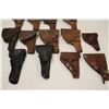 Image 3 : Large lot of military holsters; European,  U.S.; WW II to 1950’s.     Est.:  $150-$300.