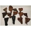 Image 4 : Large lot of military holsters; European,  U.S.; WW II to 1950’s.     Est.:  $150-$300.