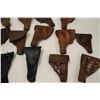 Image 6 : Large lot of military holsters; European,  U.S.; WW II to 1950’s.     Est.:  $150-$300.