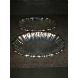 Deux plats ovales lobés assortis en argent 800/1000....
